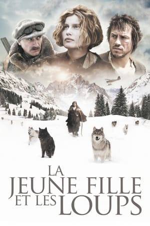 Not long before World War I, in a French Alpine town near the Italian border, a pack of slaughtered wolves is delivered to local taxidermist Leon (Patrick Chesnais). A surviving black cub comes down from the mountains looking for his family, and is saved from discovery and certain death by Leon’s young daughter Angele, who releases him back into the wild. The Great War comes and goes, making local foundry owners the Garcins rich. Family patriarch Albert Garcin (Michel Galabru), who happens to be Angele’s godfather, has given a free lifetime’s lease of a shack in the hills to a gypsy woman (played in flashbacks by Elisa Tovati in which she’s seen, literally, having dances with wolves on stage). Her son Guiseppe (Stefano Accorsi), who appears to be slightly mentally handicapped, guards the wolves he’s befriended up there, especially the black pack leader he calls Carbone.