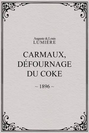 Carmaux is in south-central France, near the Tarn River. As a brick of coke, about four feet high and three feet wide, is gradually pushed out of a smelter into a yard, one worker sprays it with water from a hose while two workers with long metal rakes wait to spread it out. Other workers buzz in and out of the foreground of the stationary camera. Atop the first level of the brick smelter, workers push full carts of coal along a track.