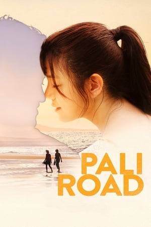 PALI ROAD is a mysterious and thrilling journey in search for true love between two different worlds. Lily, a young doctor, wakes up from a car accident and discovers she is living a completely different life. Now married to her boyfriend’s rival, Dr. Mitch Kayne, and a mother to a 5-year-old son, she has an established life she remembers nothing about.  Everyone around her denies that her boyfriend Neil ever existed. As Lily begins to doubt her own sanity, memories of Neil resurface, causing her to encounter unexplainable incidents. While desperately searching for the truth of her past life, she questions her entire existence; but in the end, she discovers the meaning of true love.