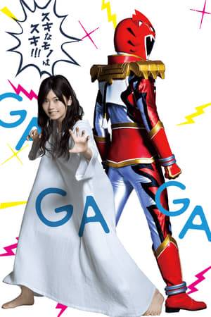 The series is based on the manga Tokusatsu Gagaga, a comedy manga by Tanba Niwa. Tokusatsu Gagaga series follows Kano Nakamura, an office lady played by Fuka Koshiba, who is secretly a tokusatsu otaku, a toku-ota. She lives her life by the code of tokusatsu heroes and often envisions herself as one as a means to make it through her daily struggles.