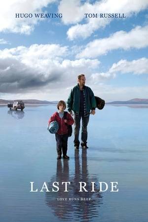 A young boy travels across Australia with his father, who's wanted by the law.