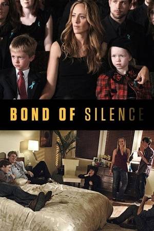 A widow's forgiveness. A killer's remorse. Bond of Silence is the true life story of a shocking murder and the amazing bond that came from it. Katy and Bob live a perfect life in a small close knit town. He's a respected lawyer, a renowned tri-athlete. She just had twins. It is New Year's Eve. Teens converge on the house next door. Always the good neighbor, Bob goes to shut it down. A confrontation occurs. Then he's dead. No teen comes forward. The media pours in. Headlines scream. Katy hunts for answers. But no one talks. A bond of silence covers the town. The police do an undercover sting and someone's caught. Ryan, a popular kid, tries to be cool, but the burden of what he did that night is unbelievable. Ryan and his attorney want to plead not guilty, but then Katy and Ryan meet. Where Katy should be a grieving wife, she becomes a supportive mother. Rather than berating, she listens. Rather than accusing..