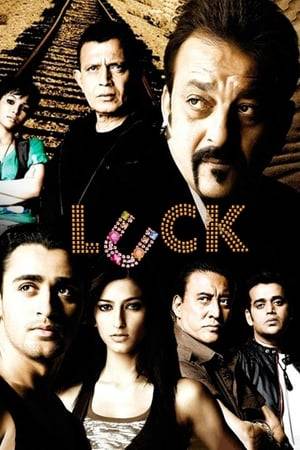 Born lucky, Karim Moussa takes to exploiting it instead of focusing on studies. Now a wealthy gambler, he decides to recruit about a dozen lucky people to participate in a deadly game of survival.