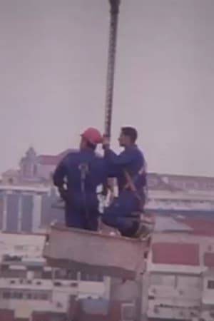 Two workers hung in a crane talking about love. Shot by chance from a roof.
