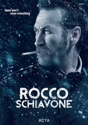 Weed smoking, foulmouthed Rocco Schiavone is an offbeat Deputy Commissioner of the State Police. For disciplinary reasons he is transferred to the Alpine town of Aosta, far from his beloved Rome. The sophisticated but cranky Roman despises the mountains, the cold, and the provincial locals as much as he disdains his superiors and their petty rules. But he loves solving crimes.