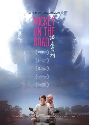 Mickey is a twenty-something Taiwanese woman: sporting short hair, a baseball cap, and impressive tattoos, she’s both tough and depressed. Her best friend, Gin Gin, is an ultra-femme bleached blonde go-go dancer. Gin discovers she’s pregnant while her boyfriend is ghosting her. Since he’s also in Guangzhou, Micky and Gin Gin decide to head out on the road together. After their luggage is stolen, they’re taken in by a stranger and introduced to a glitzy, bizarrely otherworldly urban metropolis, and their road trip takes several strange and frightening turns.