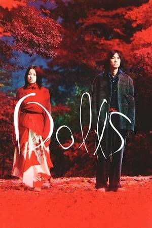 Dolls takes puppeteering as its overriding motif, which relates thematically to the action provided by the live characters. Chief among those tales is the story of Matsumoto and Sawako, a young couple whose relationship is about to be broken apart by the former's parents, who have insisted their son take part in an arranged marriage to his boss' daughter.